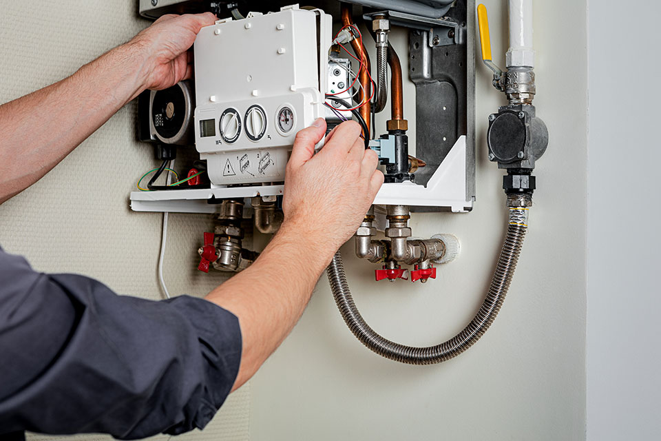 Gas Safe engineer diagnosing a Vaillant boiler fault in Musselburgh